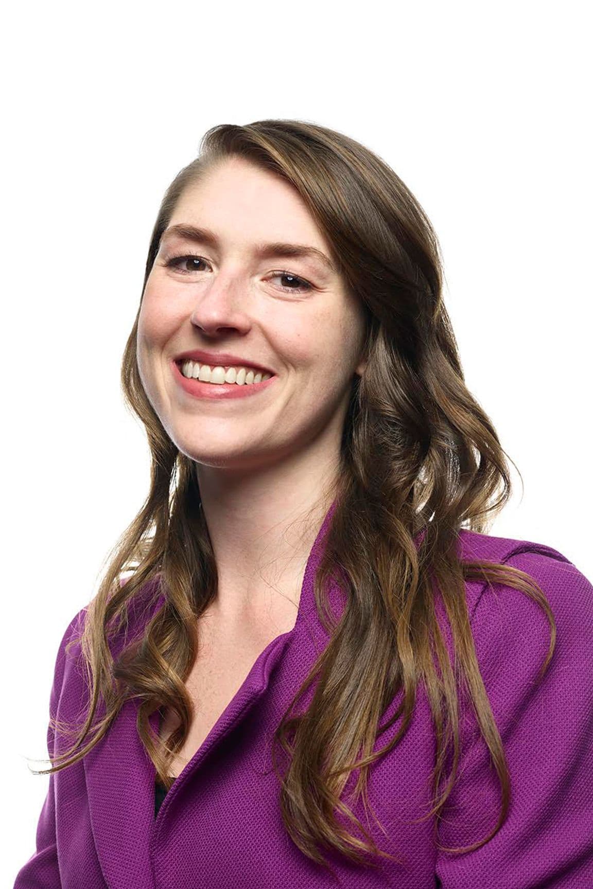 Melinda Welch headshot against a white backdrop.